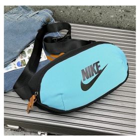От бренда Nike черно-голубая бананка с фирменным лого