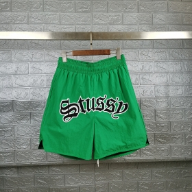 Шорты SSB зеленые с принтом "STUSSY" и боковыми карманами
