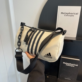 Компактная сумка в молочном цвете Adidas с карманом