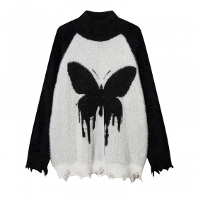 От бренда Smoking Time черно-белый свитер с бабочкой на груди