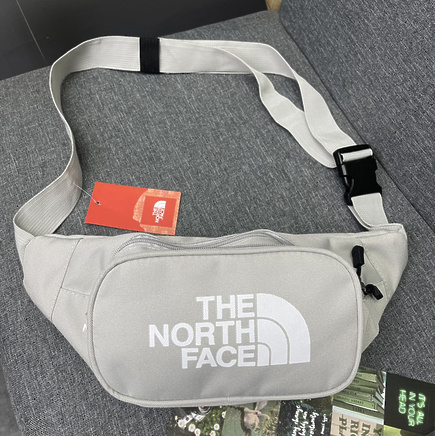 Серая сумка на пояс The North Face с регулирующим ремнём