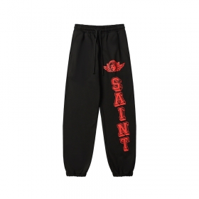 Чёрные Saint Michael с красной надписью спортивные с карманами штаны