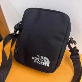 Универсальная чёрная сумка кросс-боди через плечо The North Face