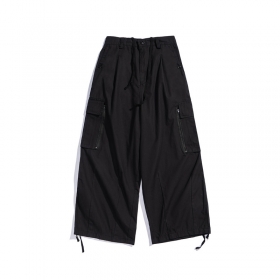 Широкие брюки-карго PMGO чёрные с боковыми нашитыми карманами