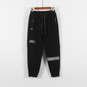 Чёрные джоггеры Bape 2в1 декорированы 2 карманами и логотипом бренда.