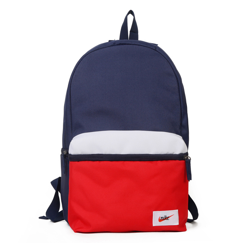Вместительный рюкзак Nike синего цвета с малым красно-белым карманом