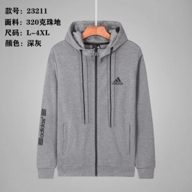 Мягкое Adidas худи серого цвета с карманами и логотипом на рукаве