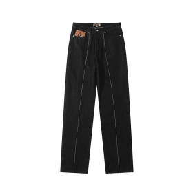 Чёрные джинсы с вышивкой от Corteiz и декоративной строчкой