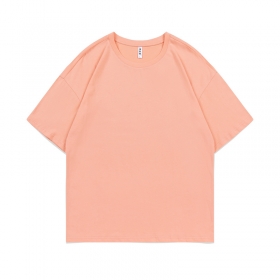 Эффектная модель стильной футболки YEE в персиковом цвете