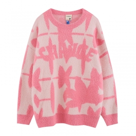 Розовый свитер THE UNAVOWED с необычным принтом и надписью