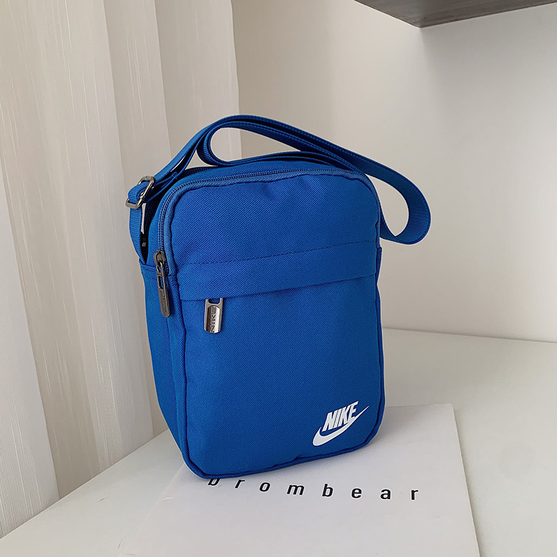 Сумка-барсетка Nike красивого синего цвета белым лого 