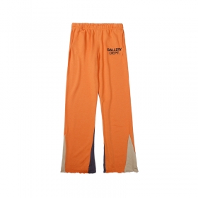 Просторные оранжевые штаны GALLERY DEPT с карманами
