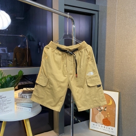 Эластичные бежевые шорты от бренда The North Face с плотным ремешком
