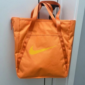 Красивая сумка Nike оранжевого цвета для любителей выделиться