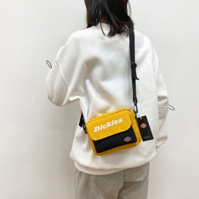 Жёлтая сумка от бренда Dickies из плотной текстильной ткани