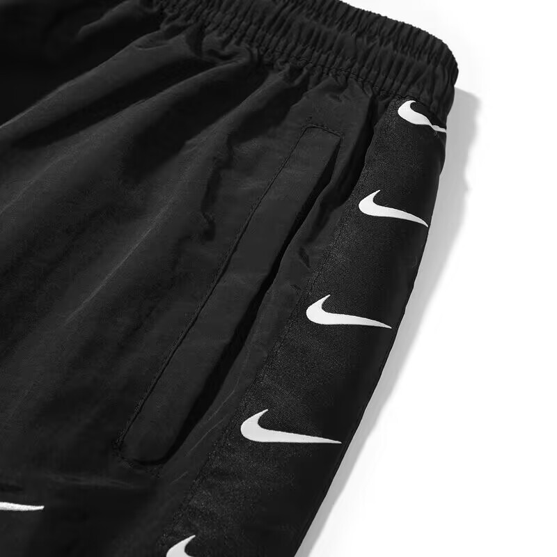 100% нейлоновые быстросохнущие Nike чёрные спортивки с лого по бокам