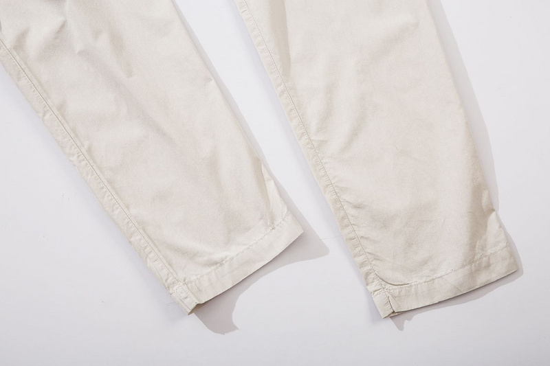 Бежевые классические штаны Stone Island с накладными карманами
