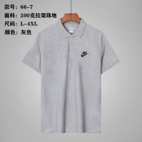 От бренда Nike серое поло-футболка на пуговицах выполнено из хлопка