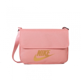 Nike розовая сумка через плечо с жёлтым логотипом из прочного текстиля