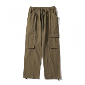 Прямого кроя коричневые штаны с вышитым лого TXC Pants на кармане