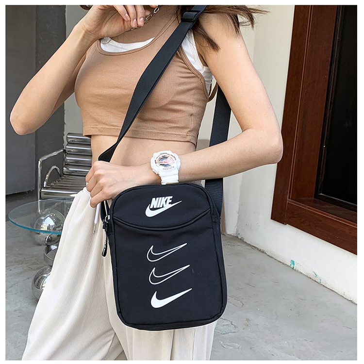 Nike чёрная сумка-барсетка через плечо с регулируемым ремешком   