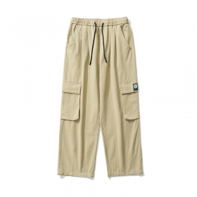Бежевые штаны бренда TXC Pants с накладными карманами сбоку