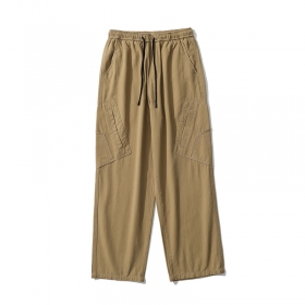 Штаны от бренда TXC Pants бежевого цвета с карманами