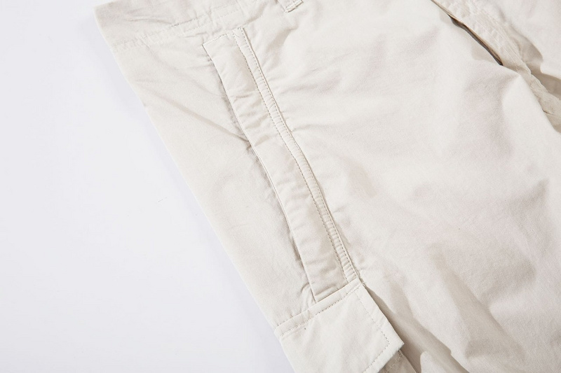 Бежевые классические штаны Stone Island с накладными карманами