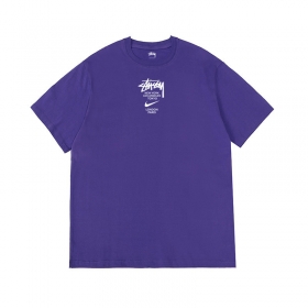 Фиолетовая футболка Stussy x Nike с белым логотипом 