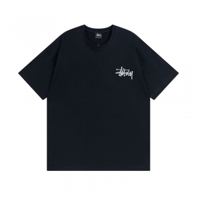 Черная футболка Stussy с ярким абстрактным цветным принтом на спине