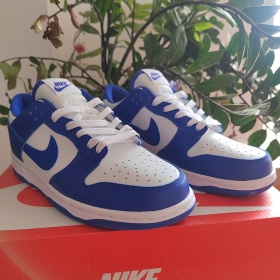 Белые кроссовки с накладками синего цвета Nike SB оптом