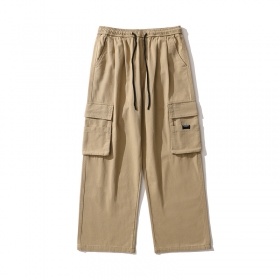 Бежевые TXC Pants штаны с накладками на карманах выполнены из хлопка