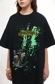 Трендовая чёрного-цвета OVDY футболка с принтом зелёные брызги краски