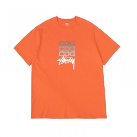 Оранжевая базовая футболка оверсайз с принтом Stussy 