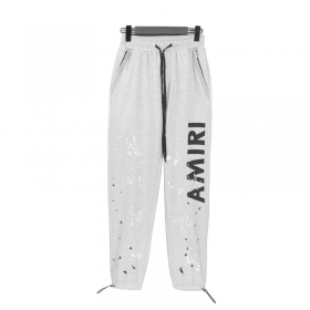 Серые спортивные штаны бренда Amiri с удобными фиксаторами и карманами