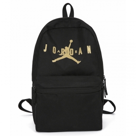 Рюкзак фирмы Nike Jordan чёрного цвета с жёлтым логотипом
