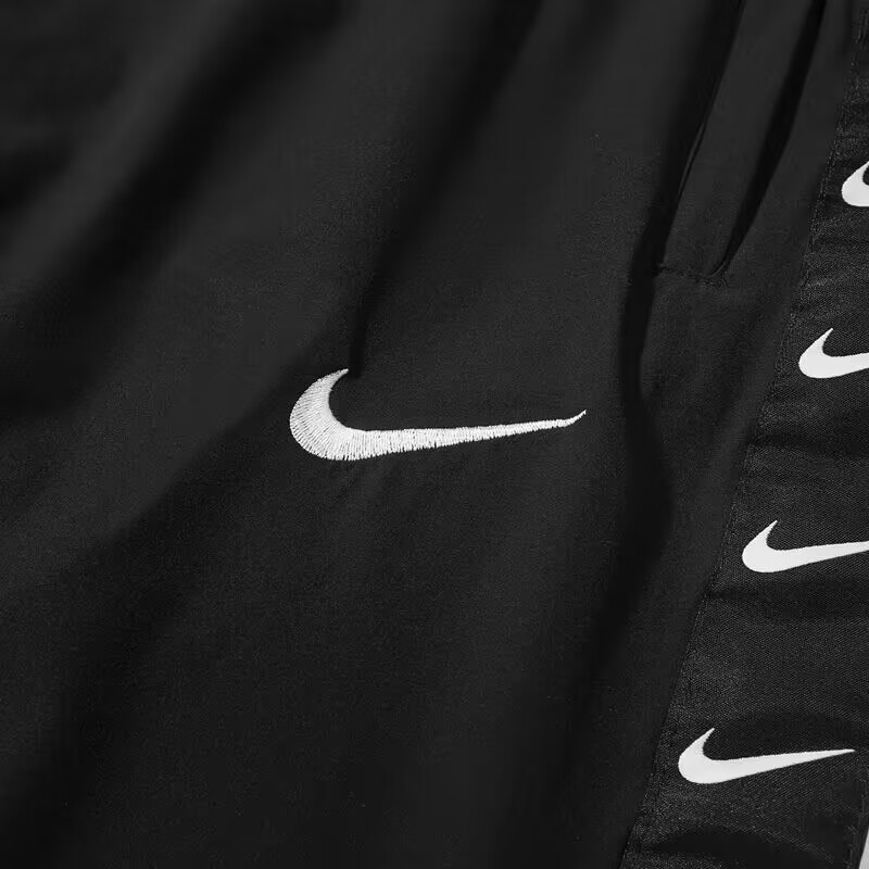 100% нейлоновые быстросохнущие Nike чёрные спортивки с лого по бокам