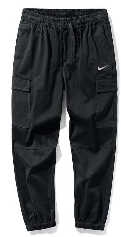 Чёрные спортивные штаны-джоггеры Nike с накладными карманами по бокам
