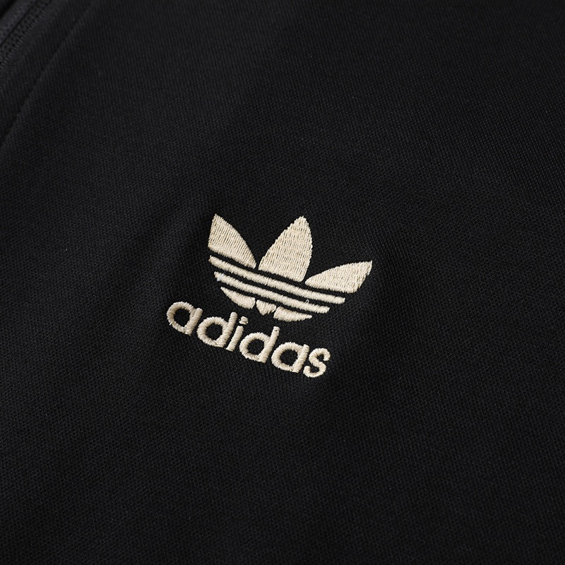 Трендовая прямого кроя чёрная олимпийка от бренда Adidas