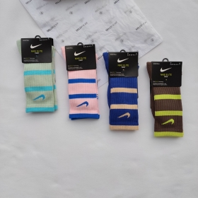 Носки Nike высокие 4 яркие расцветки в полоску