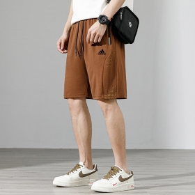 Повседневные Adidas коричневые шорты с карманами на молнии