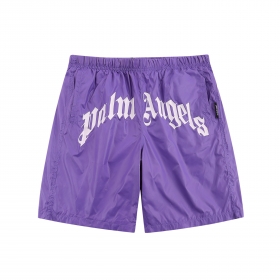 Фиолетовые короткие шорты Palm Angels с белой надписью бренда спереди