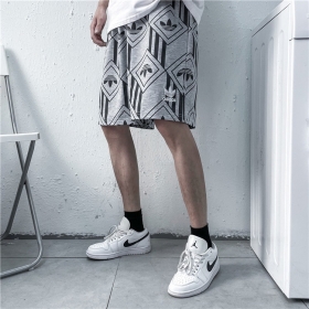 Серые эластичные шорты Adidas с карманами по бокам