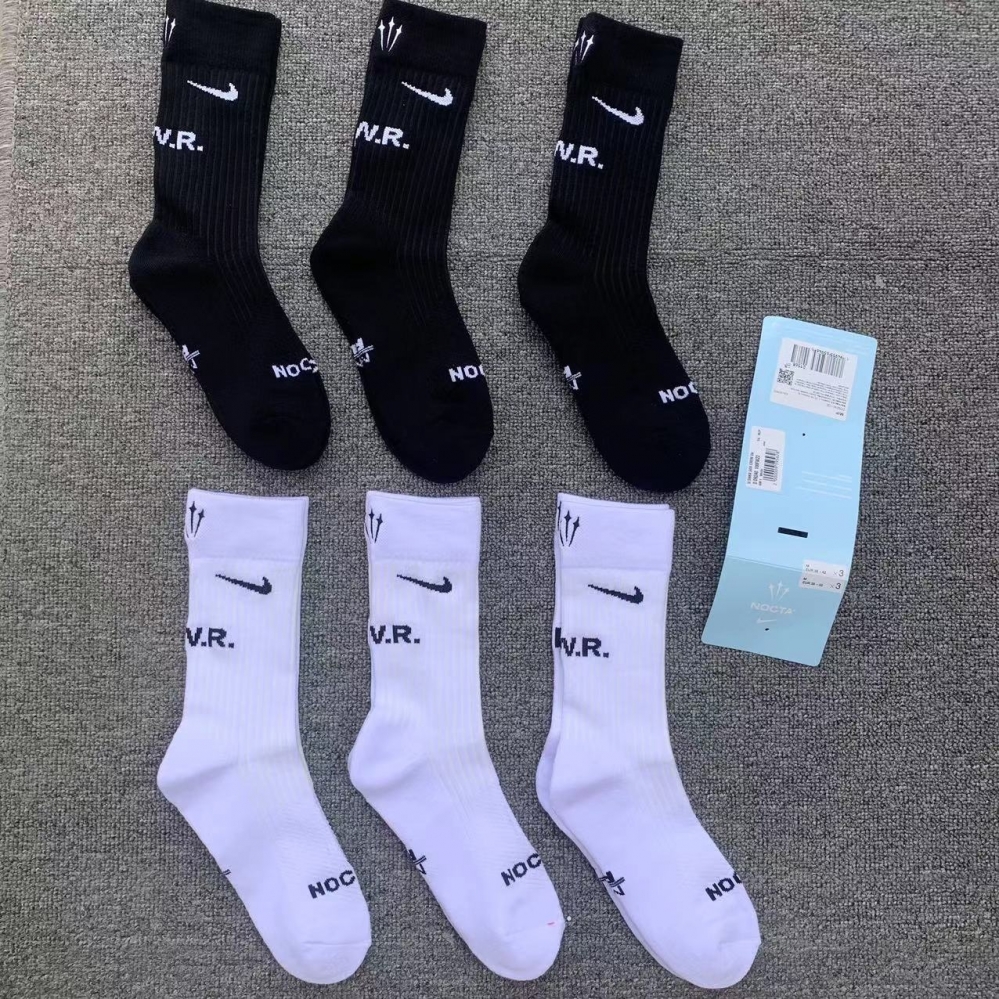 Чёрные и белые носки из 3 пар от бренда Nike Nocta из 85% хлопка