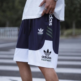 Сине-белые спортивные шорты с логотипом по бокам Adidas
