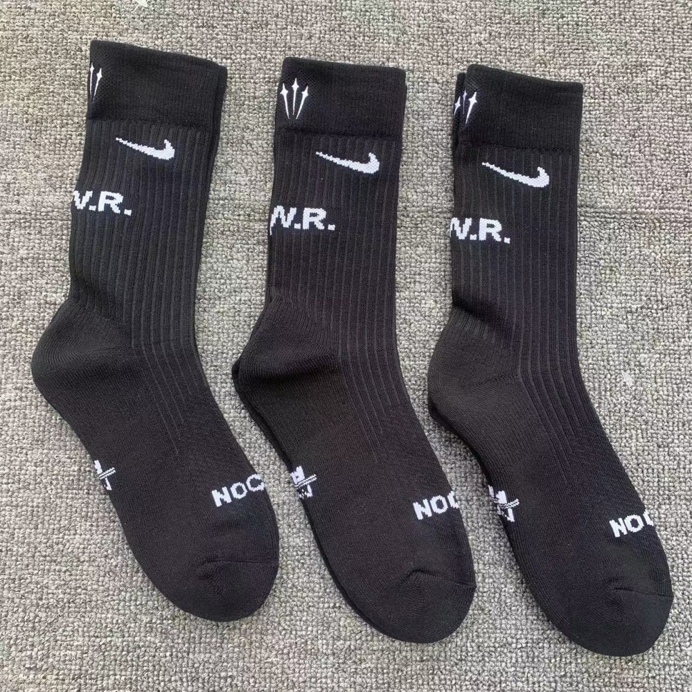 Чёрные и белые носки из 3 пар от бренда Nike Nocta из 85% хлопка