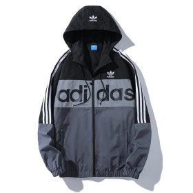 Ветровка Adidas чёрно-серая с вышитым логотипом на капюшоне и на груди