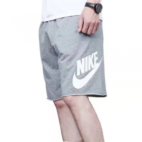Серы трикотажные шорты с логотипом Nike и необработанными краями