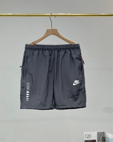 Nike серые шорты на резинке со шнурком и карманами на молнии 
