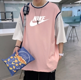 Длинная розовая Nike футболка с двойным рукавом и лого на груди